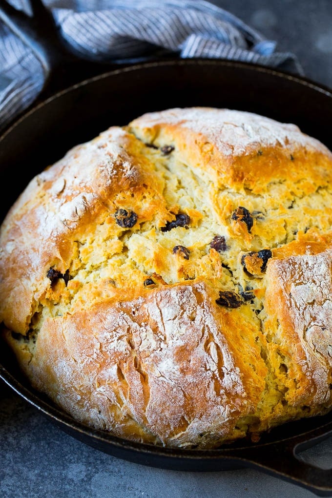 Irish Soda Bread Recipe #bread #baking #stpatricksday #sidedish #fuyos Irish soda bread baked in a cast iron skillet.