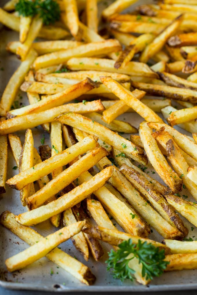 Homemade French Fries Recipe #potatoes #fries #dinner #fuyos Homemade french fries on a sheet pan.
