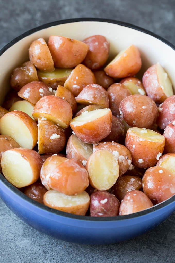 Cooked potatoes coated in cream, butter and garlic.