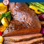 This smoked tri tip is a tender beef roast coated in a homemade spice rub, then slow smoked to perfection.