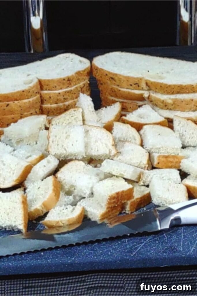Crispy Herb Garlic Croutons Made in Your Air Fryer 3 make air fryer croutons cut 4 slices of bread into 1 inch cubes