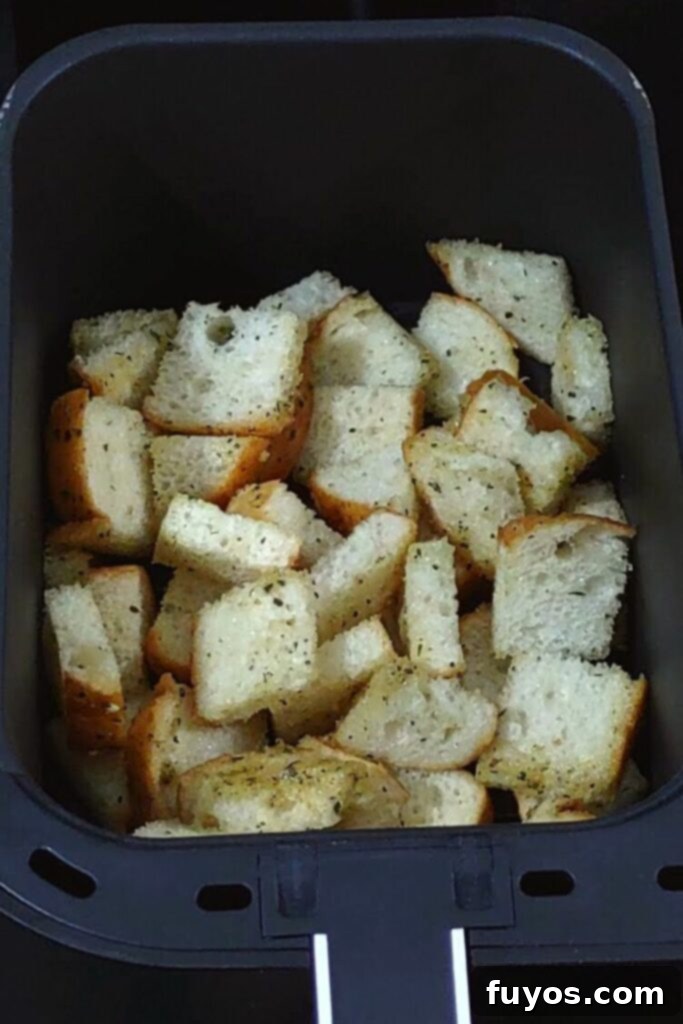 Crispy Herb Garlic Croutons Made in Your Air Fryer 6 add bread cubes to air fryer
