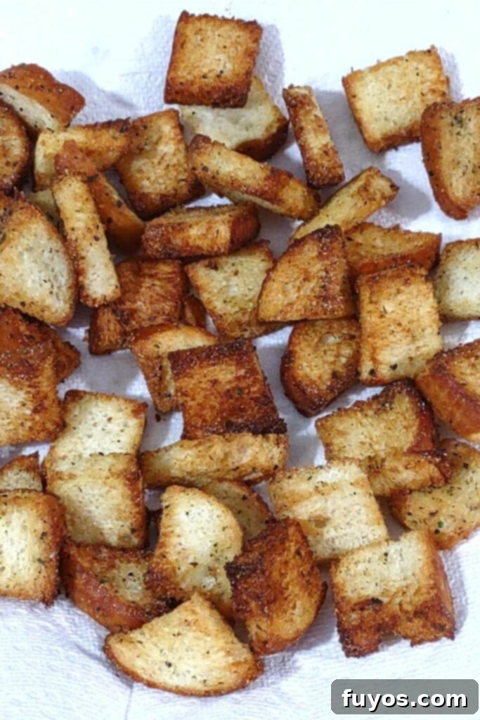 Crispy Herb Garlic Croutons Made in Your Air Fryer 8 transfer air fryer croutons to paper towel lined plate