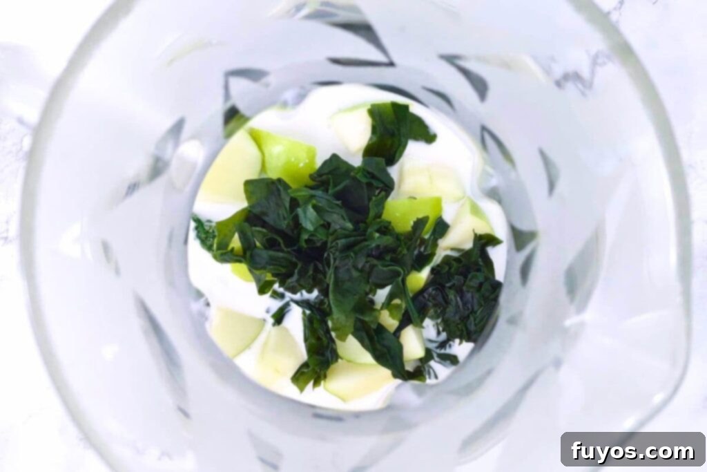 adding all seaweed smoothie ingredients to a blender
