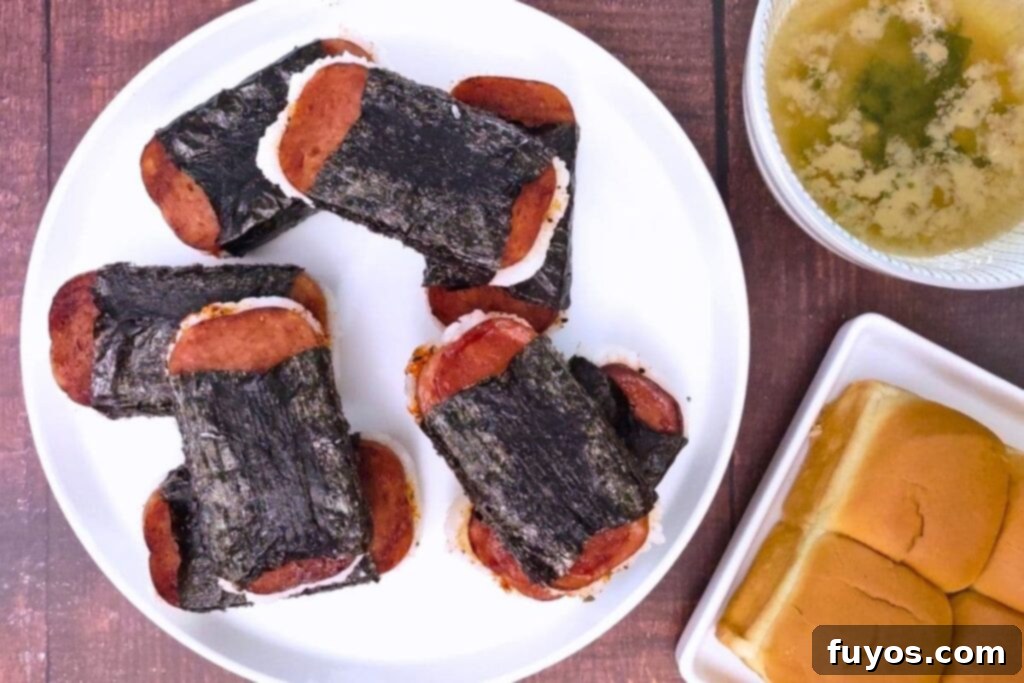 Air Fryer Spam Musubi Your Homegrown Hawaiian Treat 10 overhead view of spam wusubi stacked up on a plate with miso soup