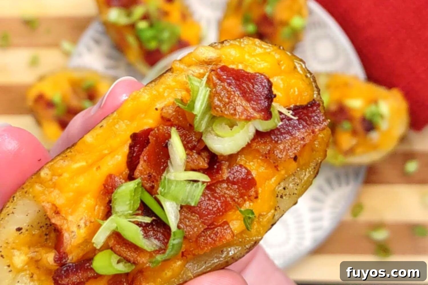 The Best Air Fryer Potato Skins 10 Close-up of homemade air fryer potato skins with real bacon bits