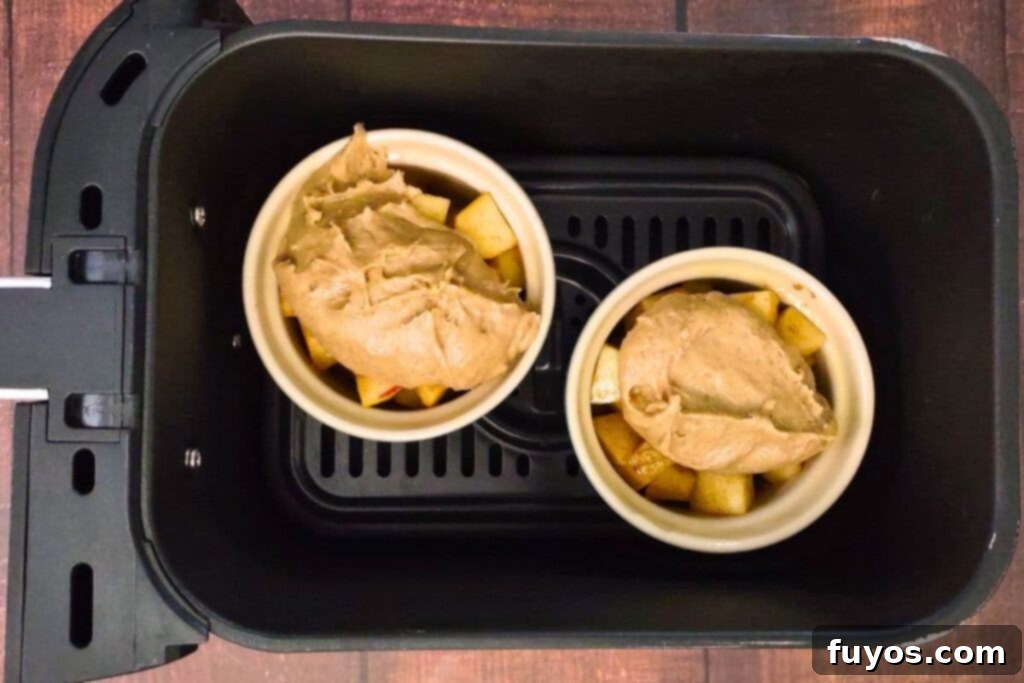 Easy Air Fryer Apple Cobbler Recipe Sweet Autumn Delight 9 place mini apple cobblers in air fryer basket