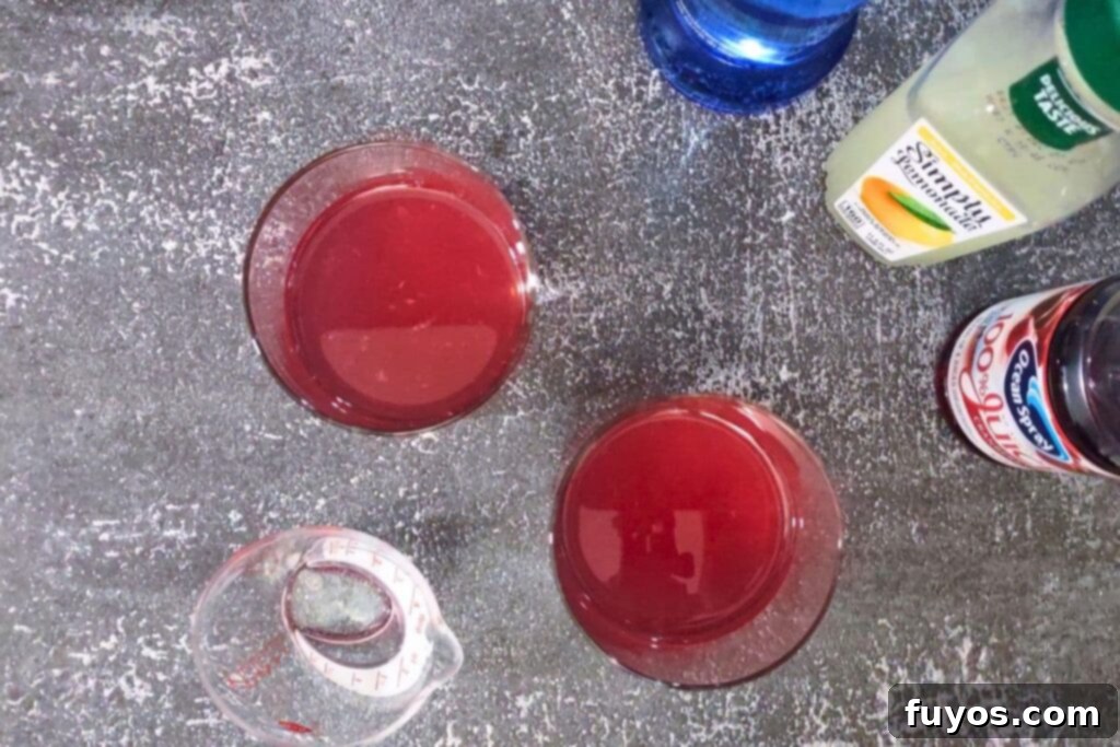 Quick 3 Ingredient Cranberry Lemon Vodka Refresher 5 add vodka, lemonade, and cranberry juice to a glass