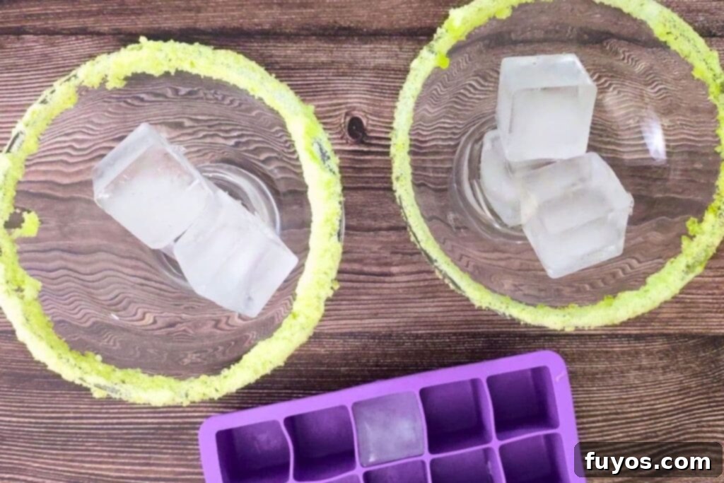 Sweet and Tart Green Apple Margarita Bliss 6 add ice cubes into your margarita glasses