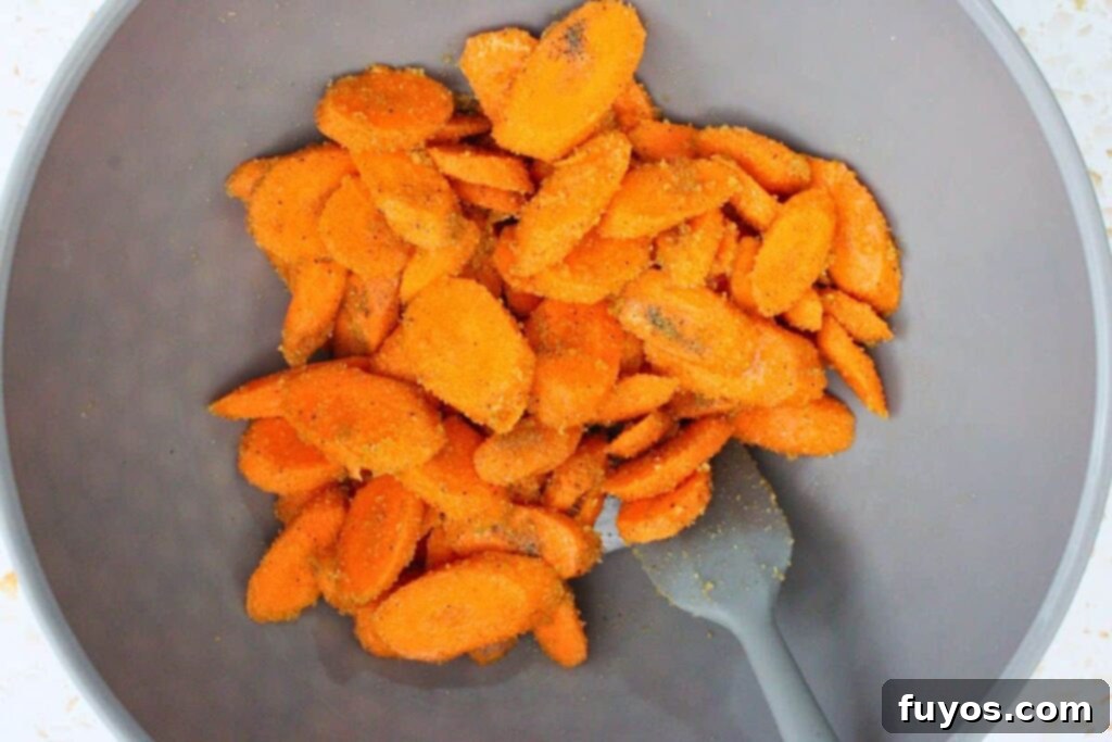 Delicious Air Fryer Brown Sugar Carrots Done in Ten Minutes 6 toss carrots in olive oil, brown sugar, salt, and pepper