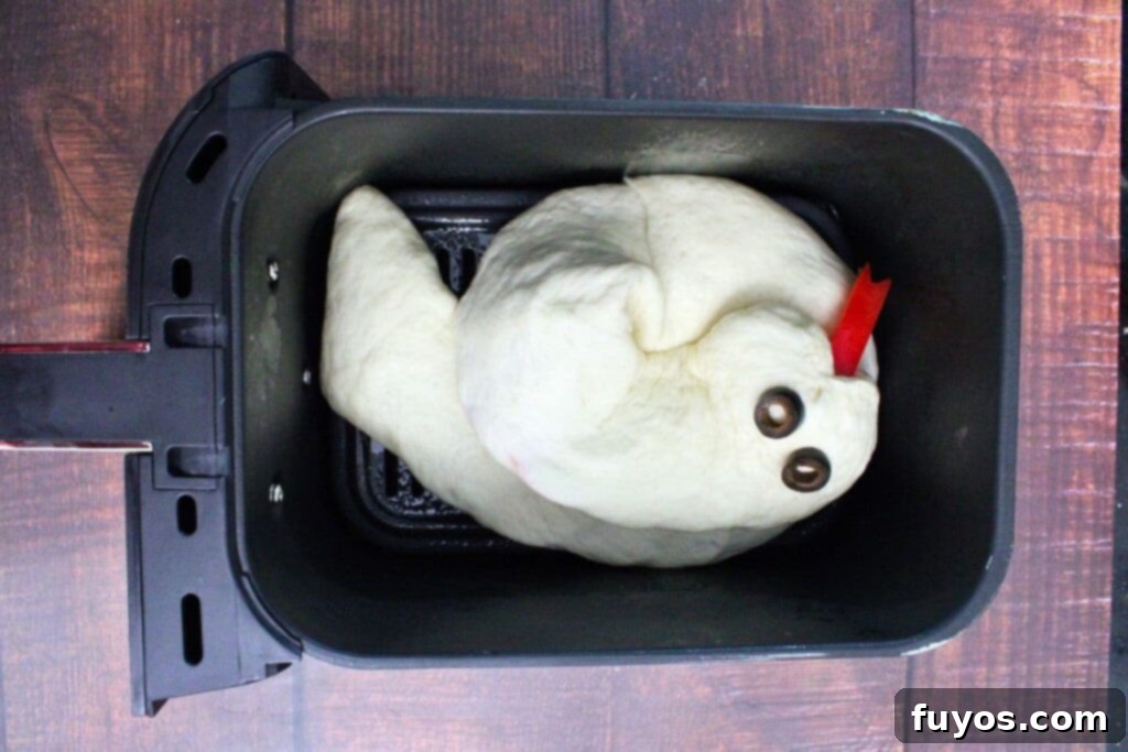 Air Fryer Serpent Bites: Your Halloween Party Hit 14 add forked red pepper tongue in the mouth