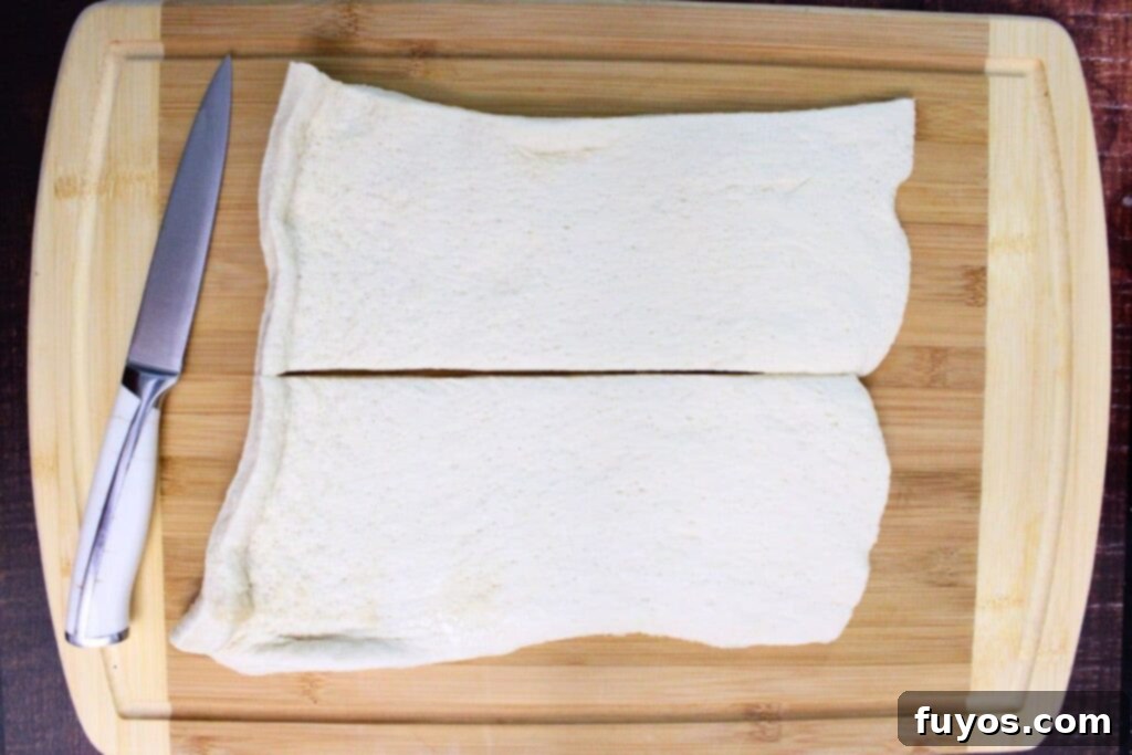 Air Fryer Serpent Bites: Your Halloween Party Hit 6 roll pizza dough flat and slice lengthwise