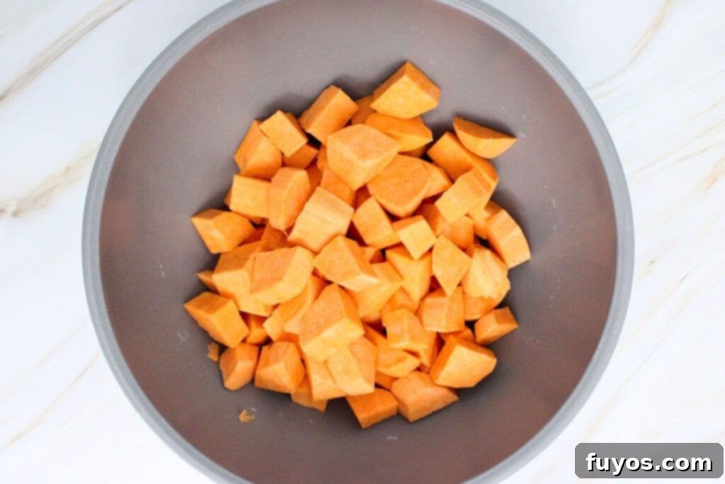 Quick Air Fryer Candied Yams Side 5 peel and cut sweet potatoes into cubes or drain canned yams