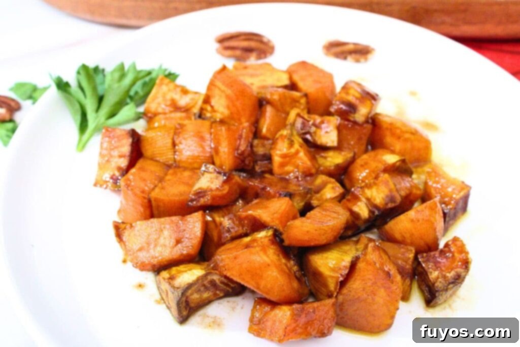 Quick Air Fryer Candied Yams Side 10 closeup view of air fryer candied yams on a plate