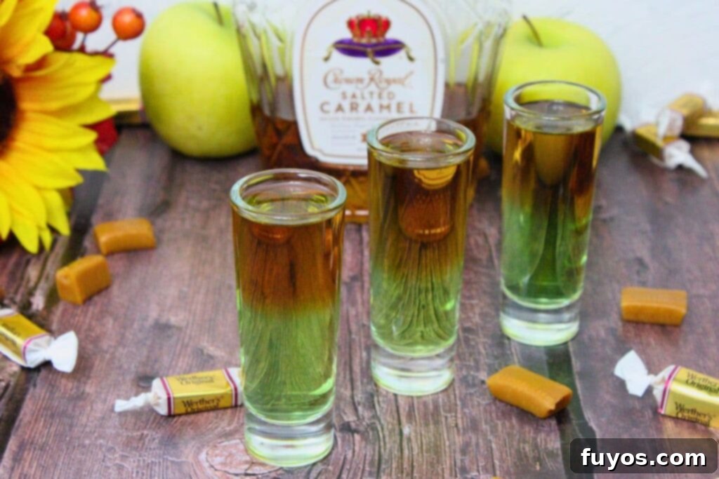 Simple Caramel Apple Crown Shot 8 layered caramel apple shots lined up and surrounded by caramel candies