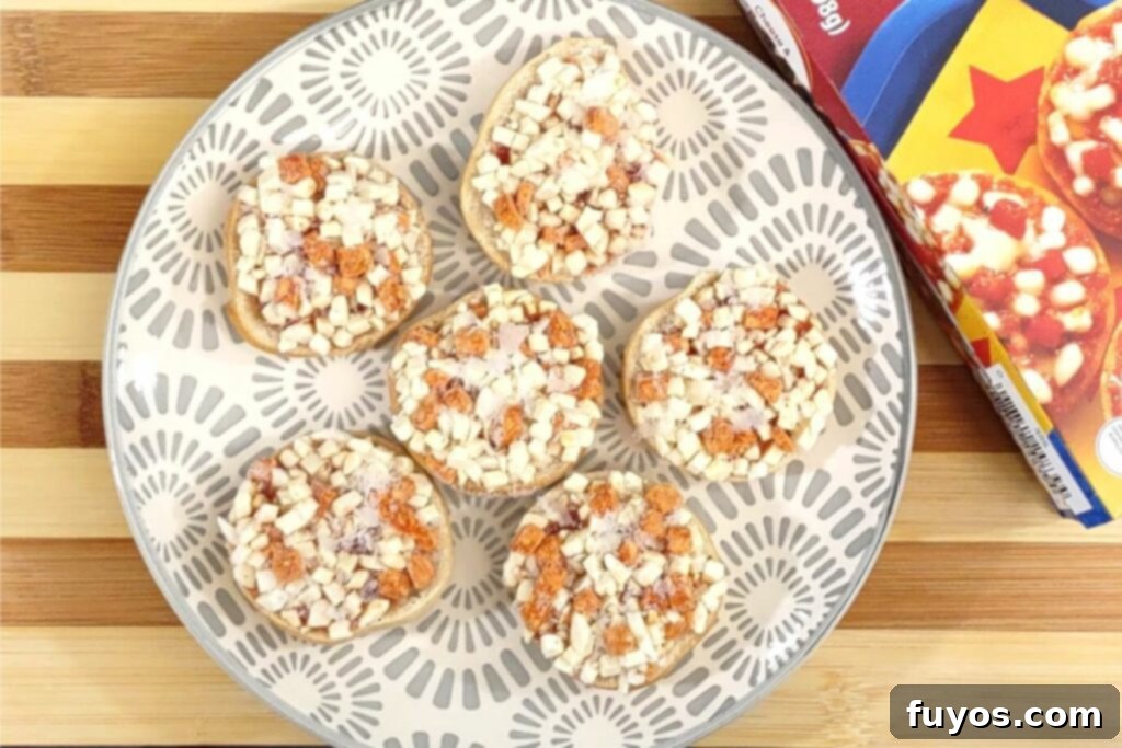 Crispy Air Fryer Bagel Bites 3 frozen bagel bites on a plate