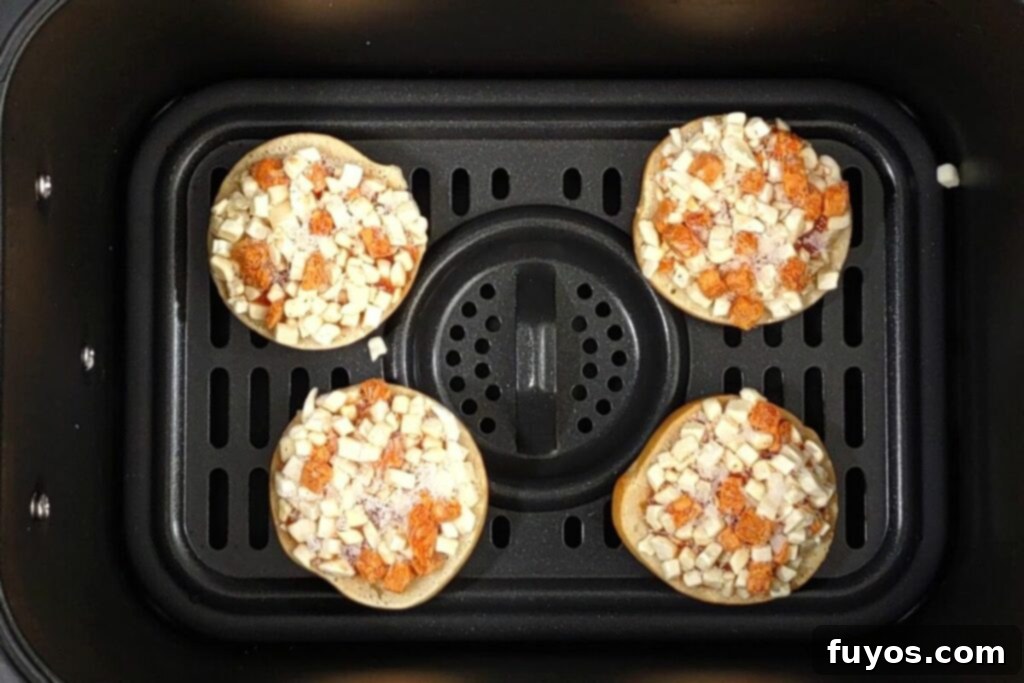Crispy Air Fryer Bagel Bites 4 four frozen bagel bites in air fryer basket