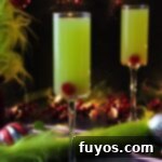 Three Ingredient Grinch Whoville Mimosas 10 grinch mimosas holiday cocktail recipe dinners done quick featured image