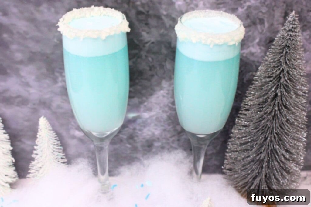 Jack Frost Mimosa Your Sparkling Winter Brunch Delight 10 refreshing cool ice blue jack frost mimosas against a dark background