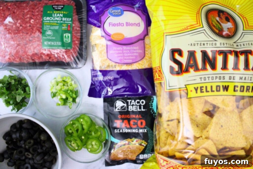 The Ultimate Air Fryer Nachos for Game Day 4 ingredients to make air fryer nachos with ground beef