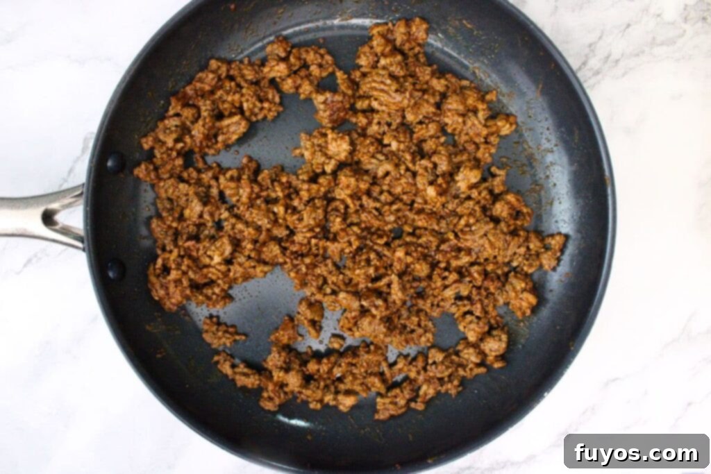 The Ultimate Air Fryer Nachos for Game Day 7 cook until you are left with seasoned ground beef