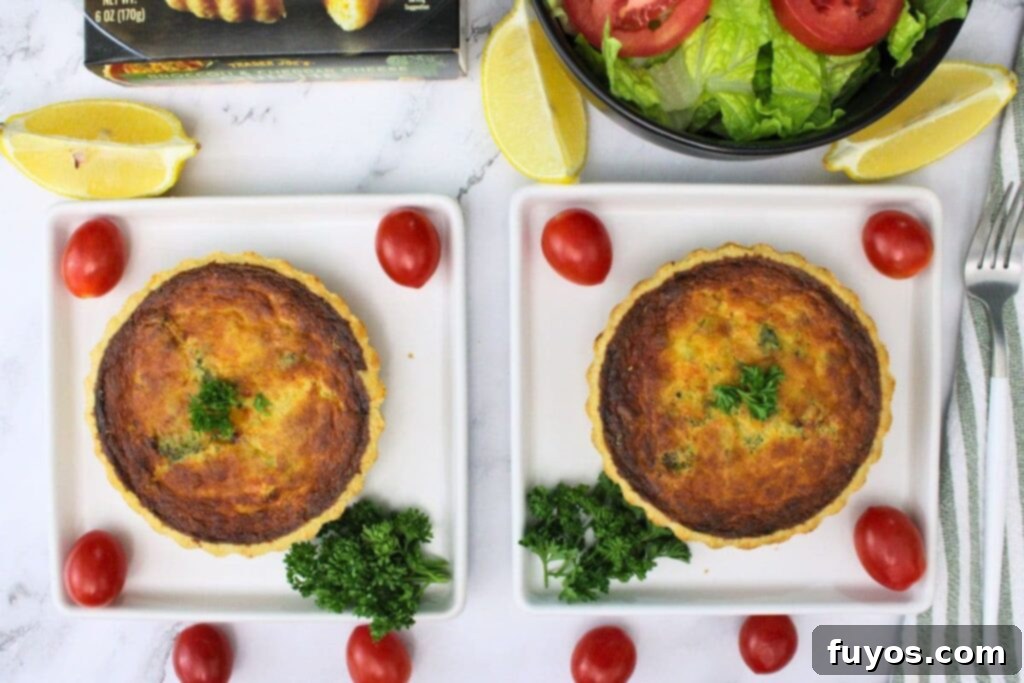 Trader Joe's Frozen Quiche Air Fryer Perfection 7 overhead view of two trader joes broccoli cheddar quiche on square plates
