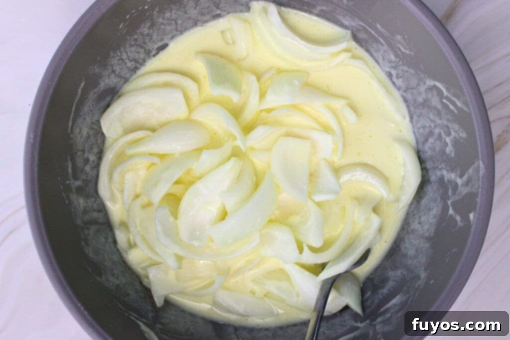 combine buttermilk and eggs then soak onions in mixture
