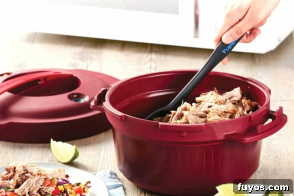 Delicious Meals in Minutes: Tupperware Pressure Cooker Microwave Recipes 2 burgundy tupperware microwave pressure cooker with shredded chicken