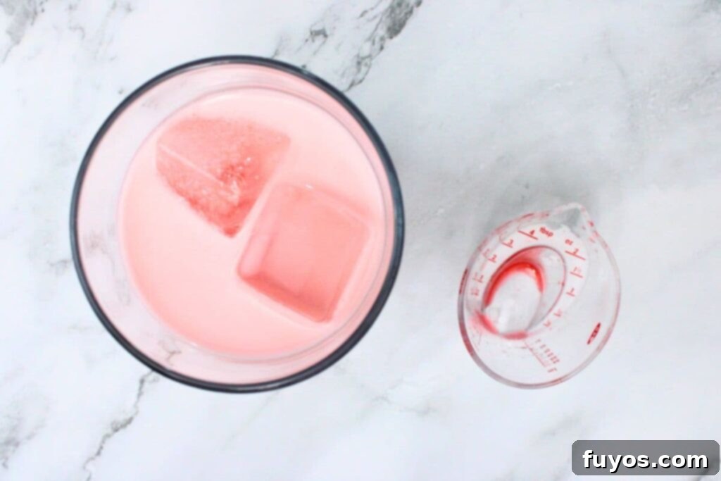 add chocolate covered strawberry martini ingredients to shaker with ice