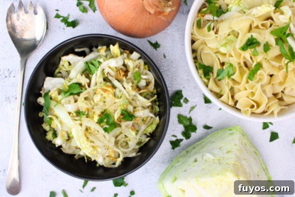 Easy 15-Minute Air Fryer Cabbage and Onions 8 overhead view of air fryer cabbage and onions in a bowl next to a bowl of haluski