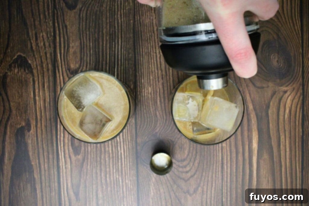 shake long island iced coffee and strain into glasses