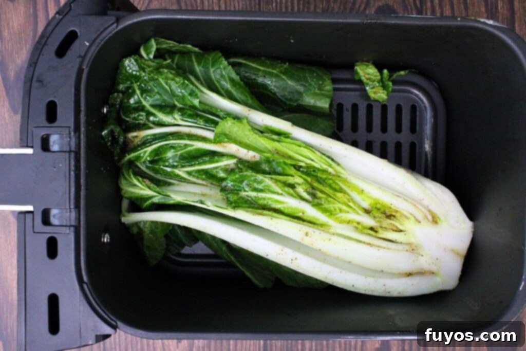 place bok choy head in air fryer basket