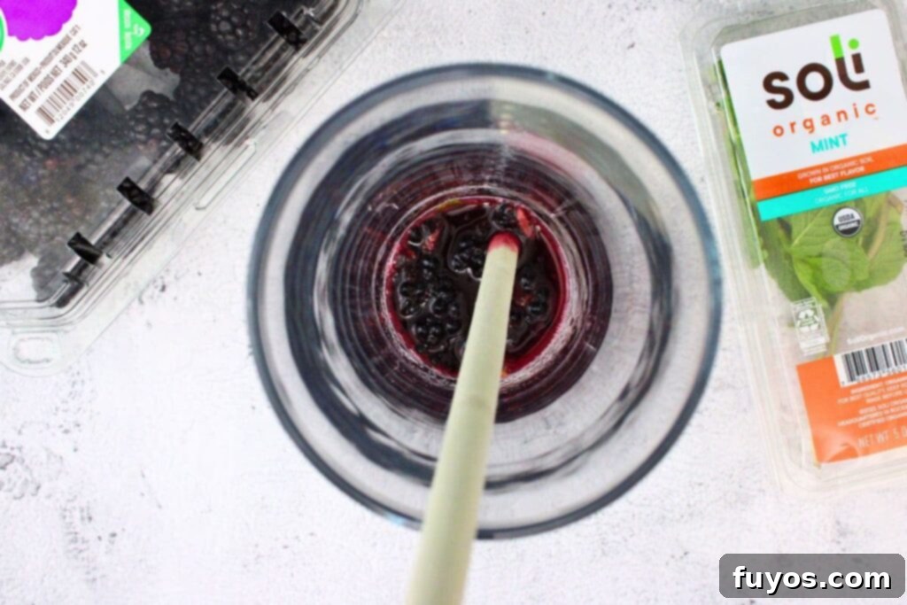 muddle the berries and mint leaves