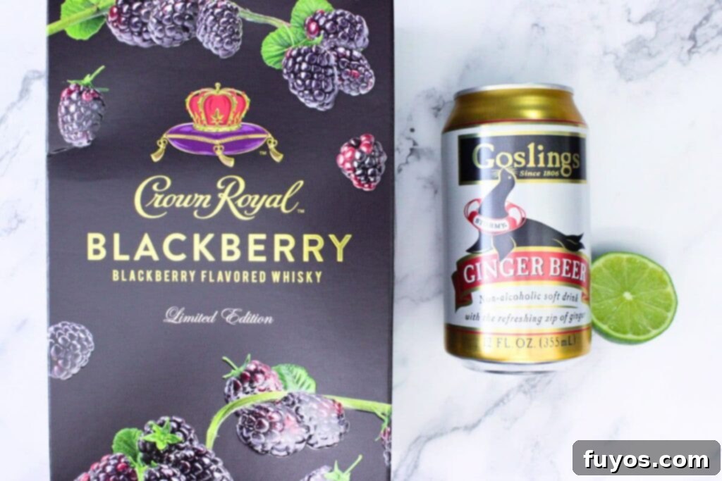 Ingredients for a Blackberry Kentucky Mule including Crown Royal Blackberry whiskey, fresh limes, and ginger beer.