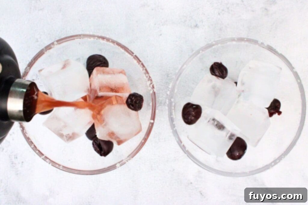 Black Cherry Tequila Burst 7 shake and strain black cherry margarita into your glass