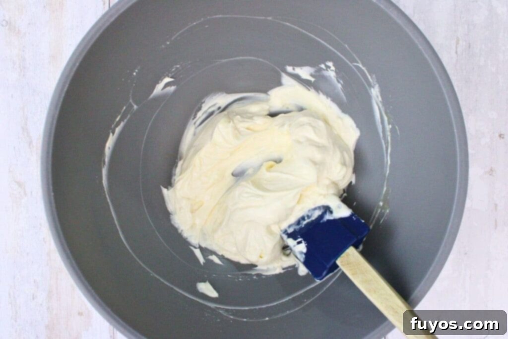 combine cream cheese, powdered sugar, and vanilla in a small bowl