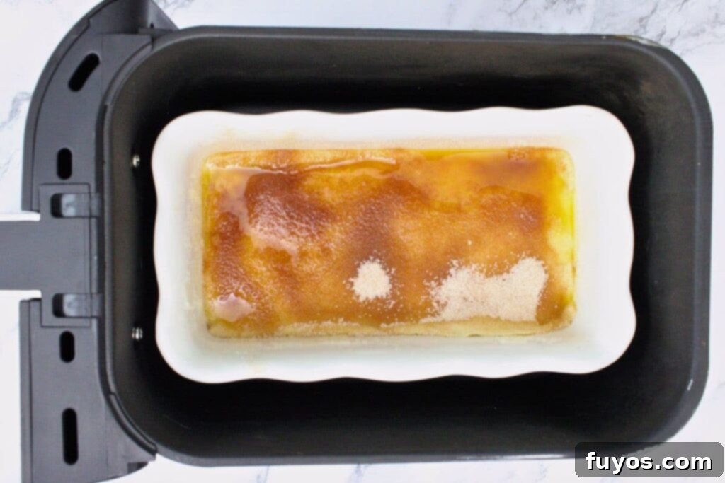 place cheesecake baking dish in air fryer basket