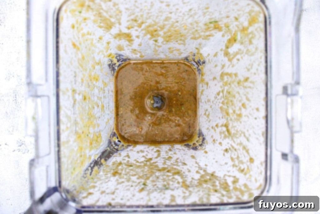 Air Fryer Copycat Cheesecake Factory Avocado Egg Rolls 5 mix ingredients for cheesecake factory avocado eggroll dipping sauce in a blender to create the perfect consistency