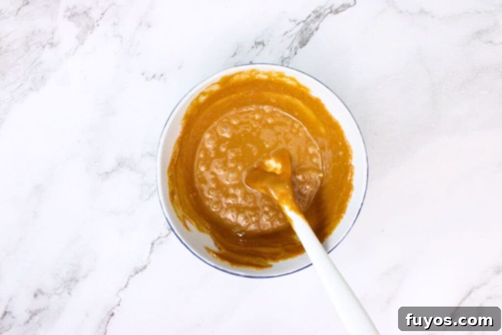 Two Ingredient Caramel Strawberry Delight 6 microwave caramel candies and stir until bubbling
