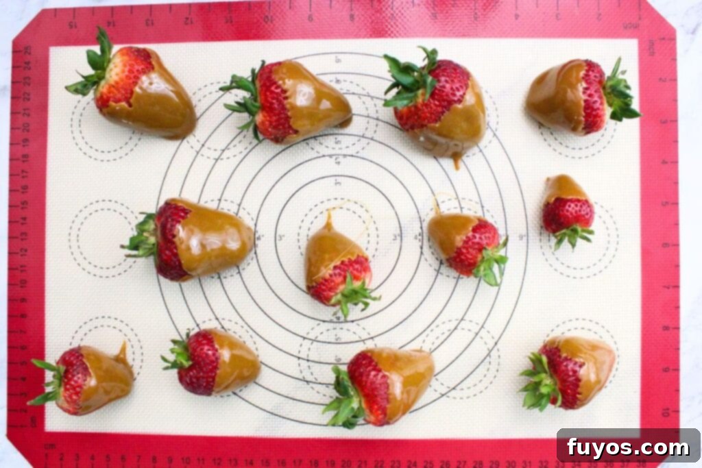 Two Ingredient Caramel Strawberry Delight 8 repeat until all strawberries have been dipped in the caramel