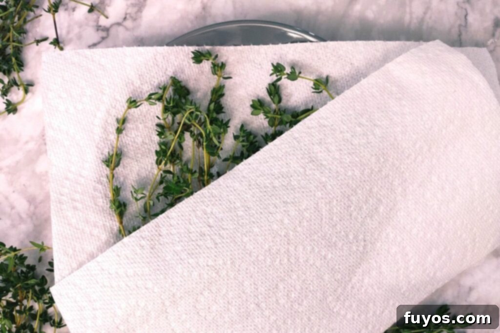 Effortless Microwave Thyme Drying 5 cover thyme sprigs with a second paper towel