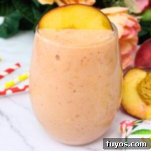 Peach Strawberry Mango Summer Bliss Smoothie 8 A vibrant peach strawberry mango smoothie, the perfect recipe for a quick, healthy, and refreshing summer drink.