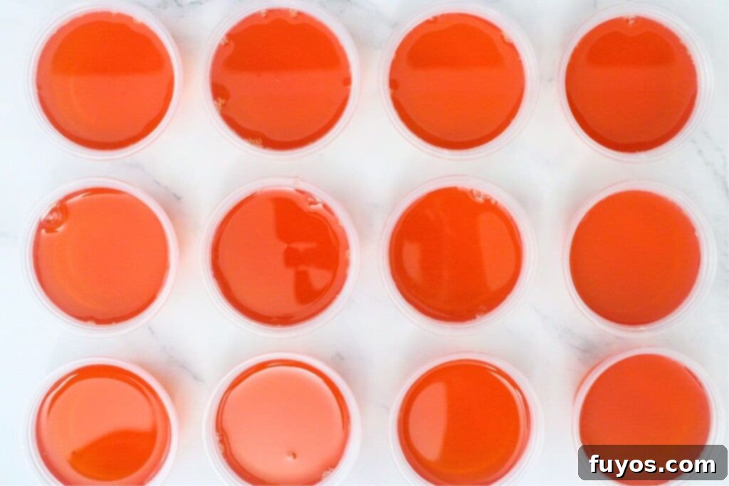 Effortless Crown Peach Jello Shots With Only Four Ingredients 8 ladle peach jello mixture into individual shot cups