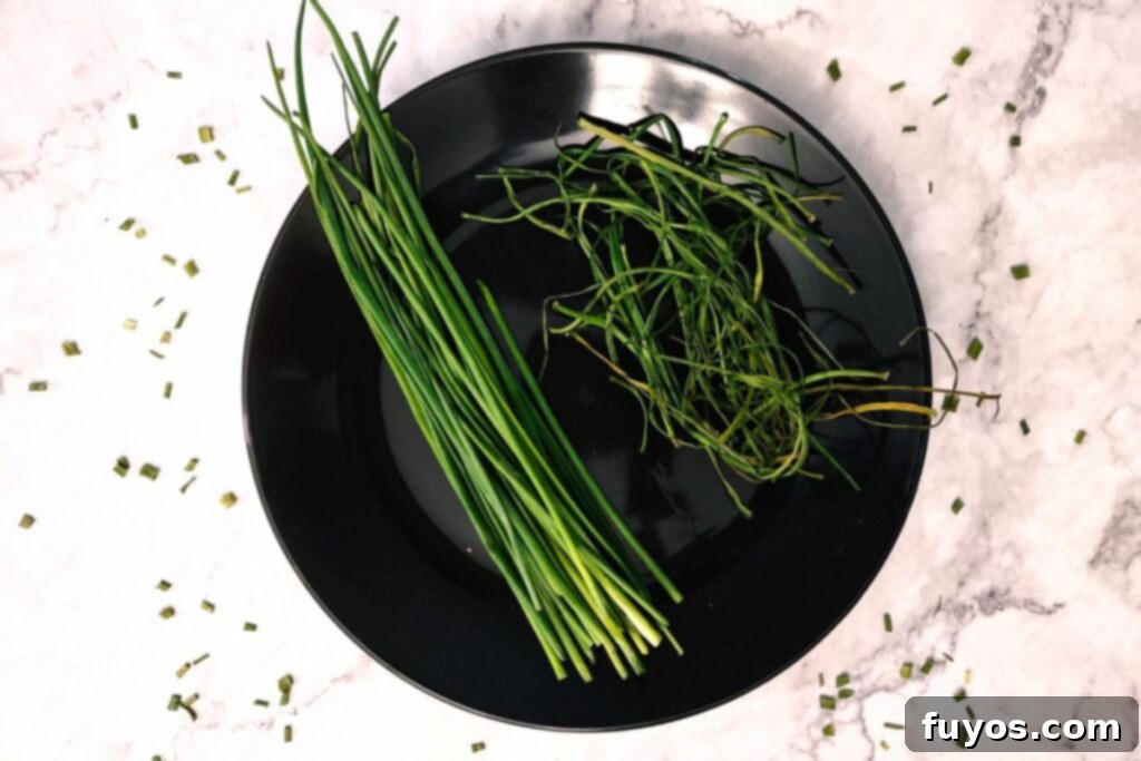 Effortless Air Fryer Chive Preservation 6 air fryer dried chives and fresh chive stalks on plate