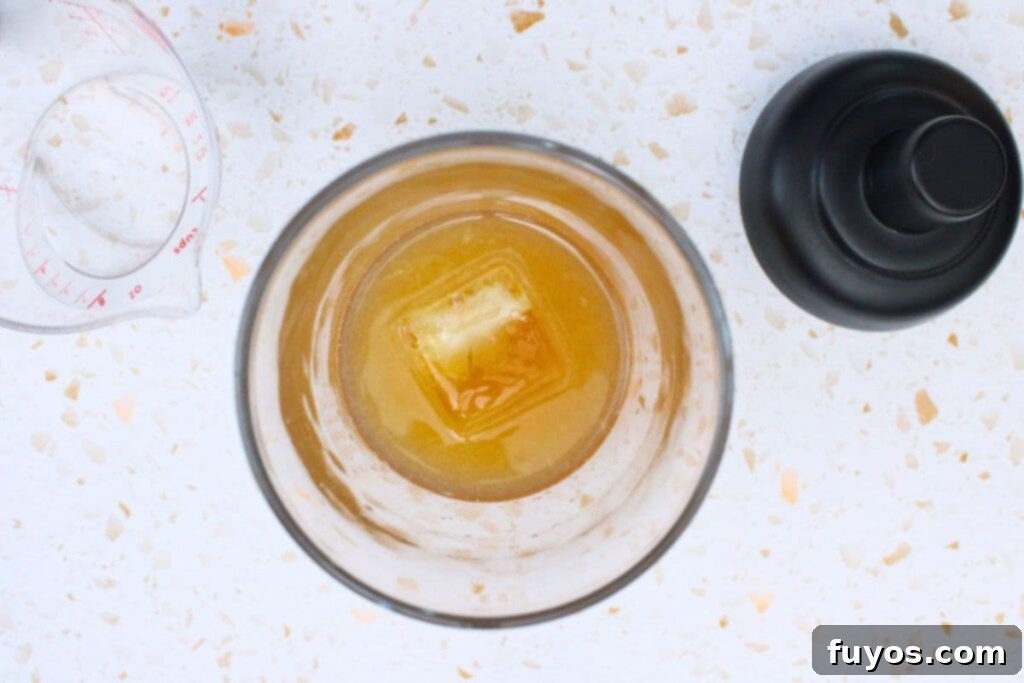 add all peach whiskey sour ingredients to cocktail shaker