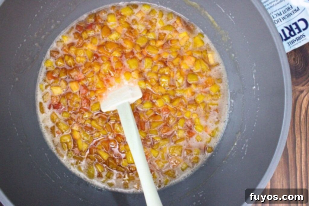 stir liquid pectin into peaches