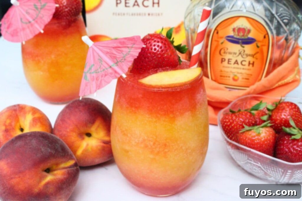 crown royal peach daiquiri surrounded by fresh fruit and liquor bottle