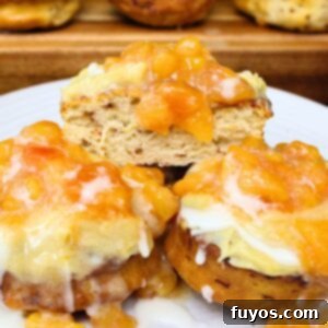 Crown Royal Peach Cinnamon Rolls recipe featured image, showing delicious rolls with peach topping.
