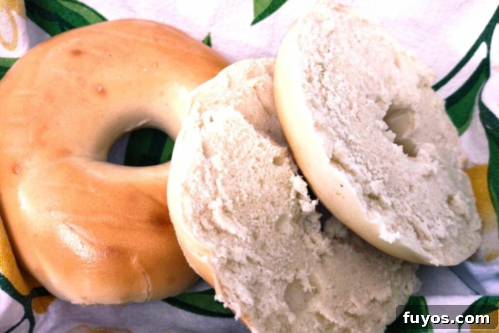 The Secret to Warm Fluffy Air Fryer Bagels 2 A perfectly defrosted bagel ready to be sliced, highlighting the ease of using an air fryer for frozen bagels.