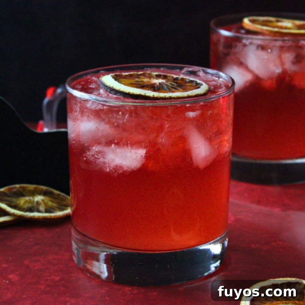 Blood Moon Rum Potion Zesty Halloween Brew 2 bubbly, refreshing citrus-based blood moon cocktail for Halloween party
